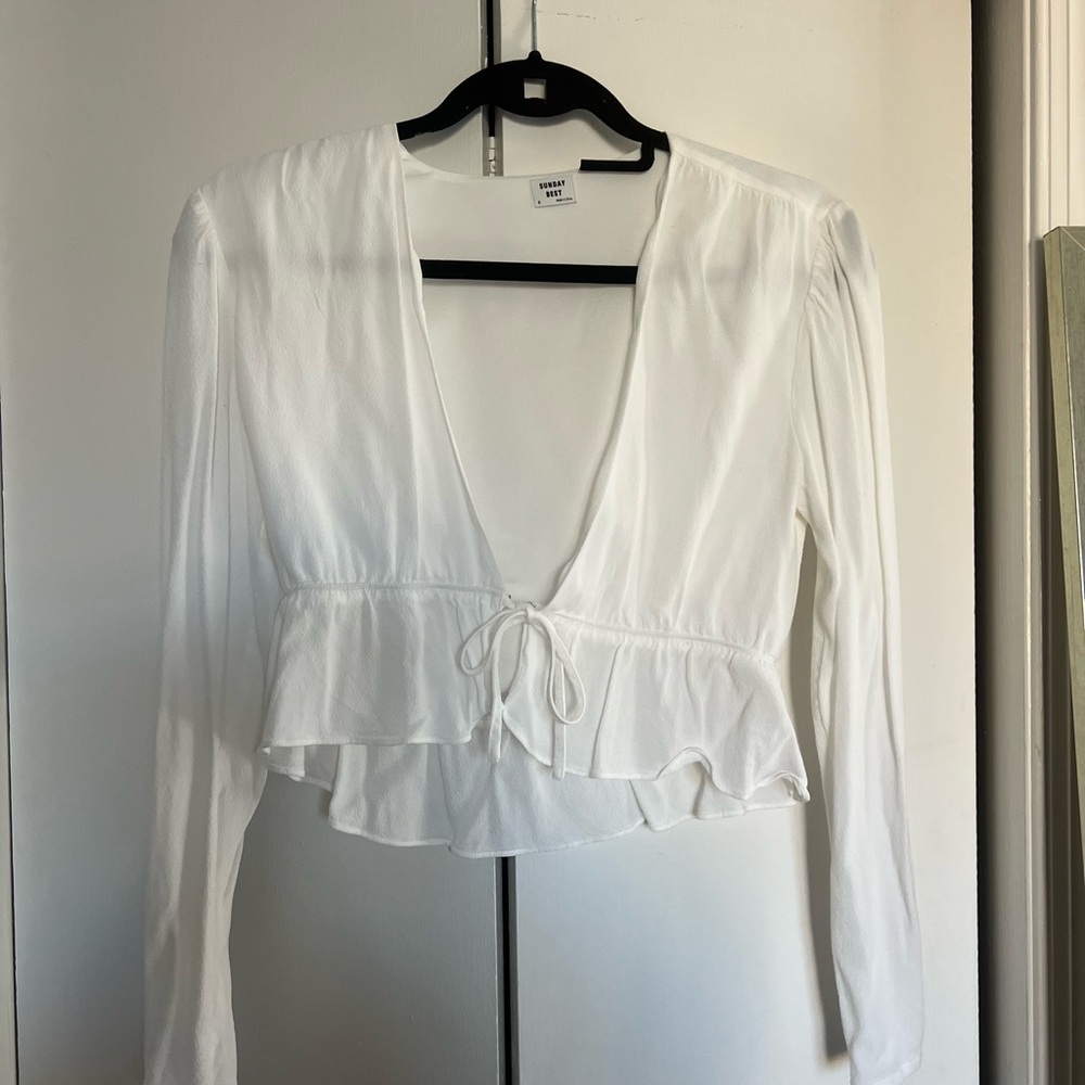 Aritxia V-Neck Blouse with Ruffle Hem